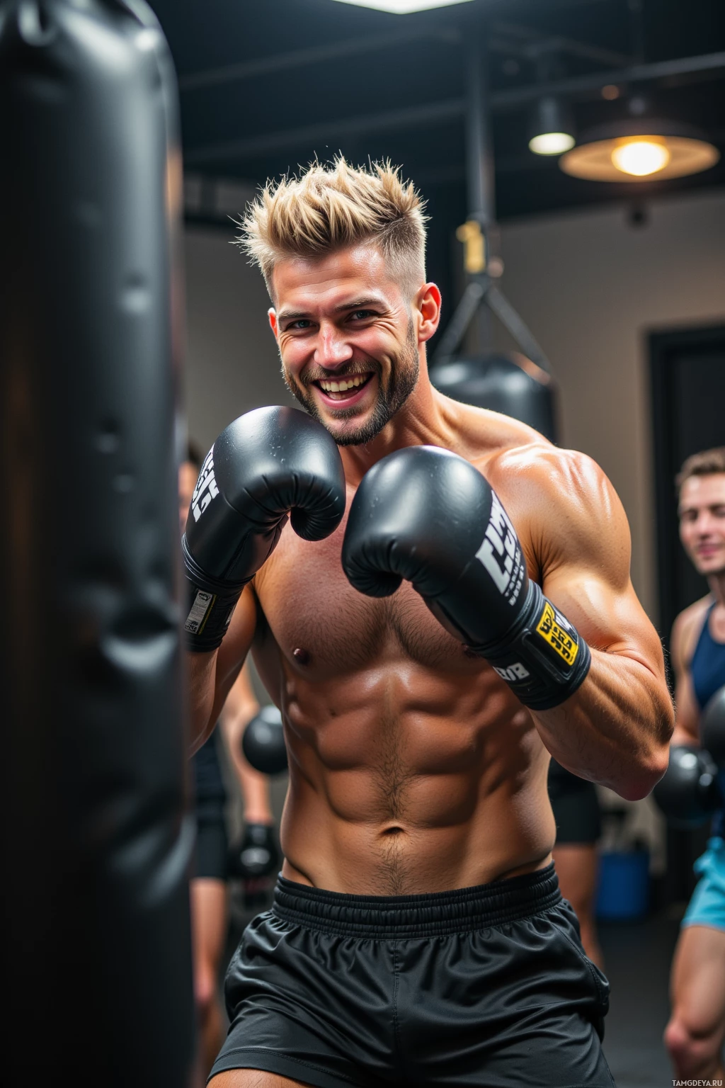A muscular man wearing boxing gloves stands in a gym, preparing to punch a heavy bag.