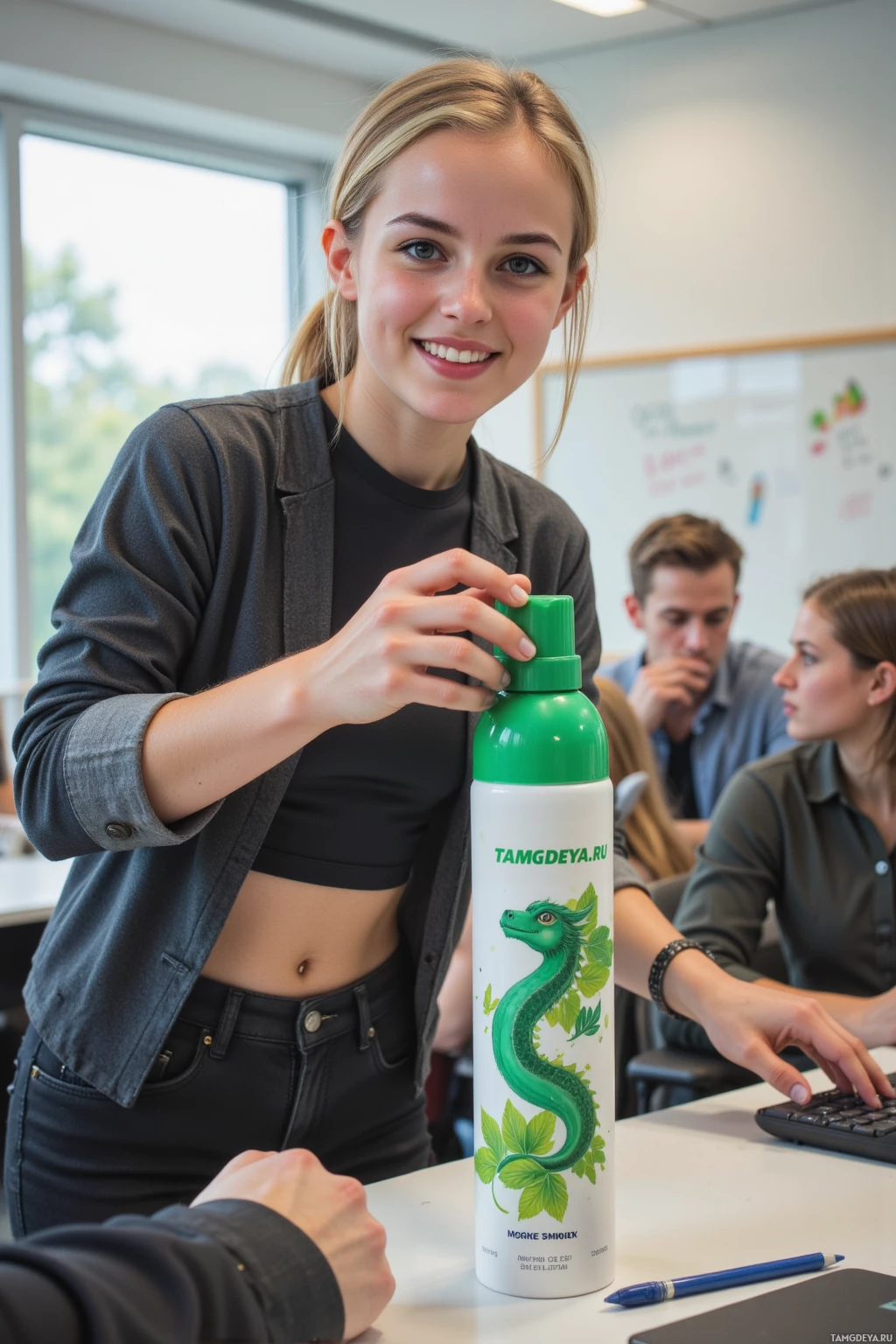 A person in a classroom setting holds a green-capped bottle with a snake design.